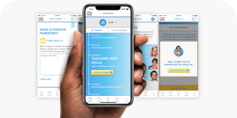 Person holding mobile device with the Triple P website on the forefront and background. 